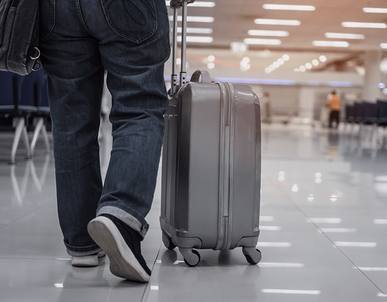 HYL - Traveler passenger hold luggage at terminal airport